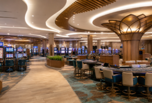 Bright smoke-free casino space with slot machines and table games inside a tribal resort