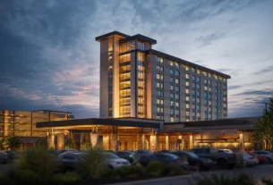 Modern casino hotel tower representing Coushatta Casino Legacy Tower and its reported liquidity crisis